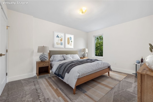 bedroom with light carpet