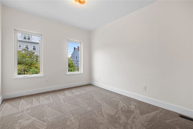 view of carpeted spare room