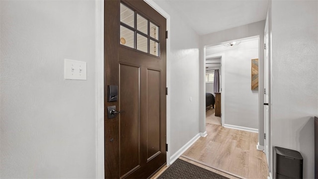 doorway to outside featuring light hardwood / wood-style floors