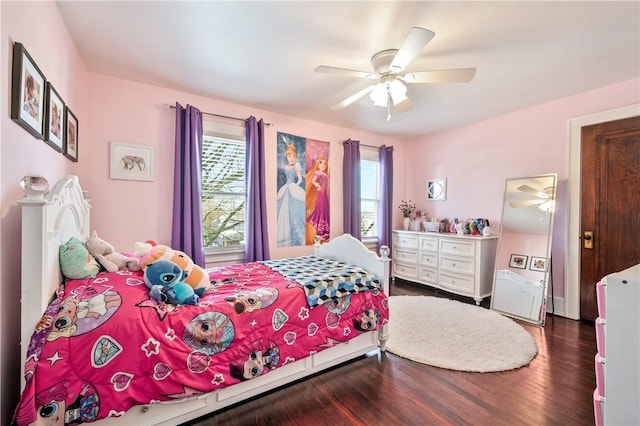 bedroom featuring dark hardwood / wood-style floors and ceiling fan