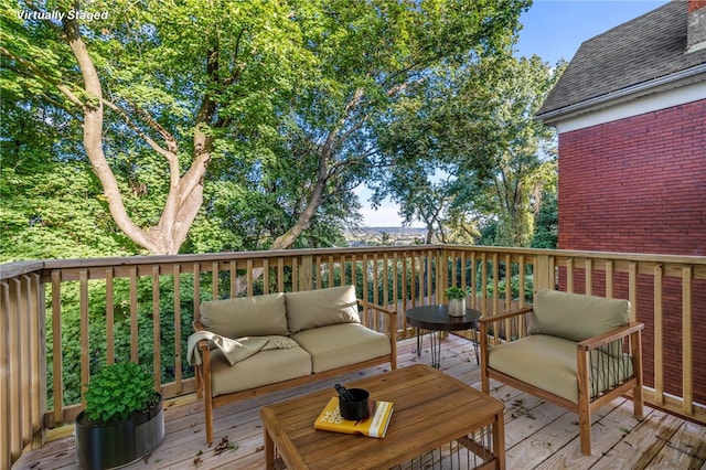 deck featuring an outdoor hangout area