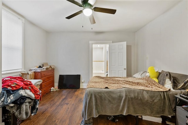 bedroom featuring ceiling fan and dark hardwood / wood-style flooring