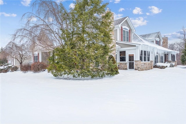 view of snow covered property