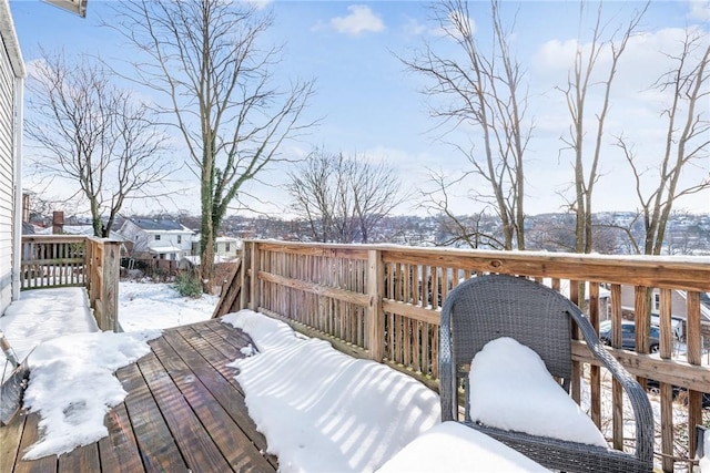 view of snow covered deck