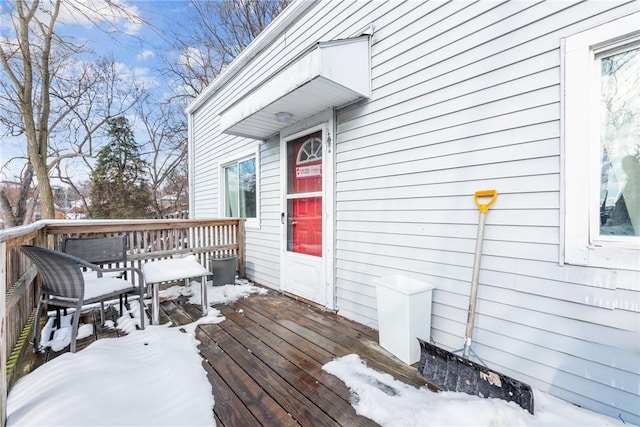 view of snow covered deck