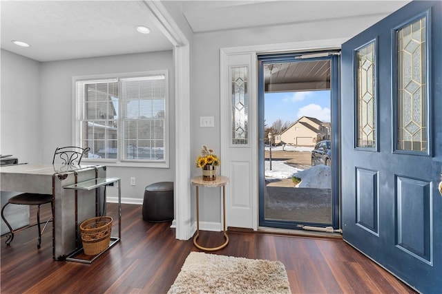 foyer with dark hardwood / wood-style floors