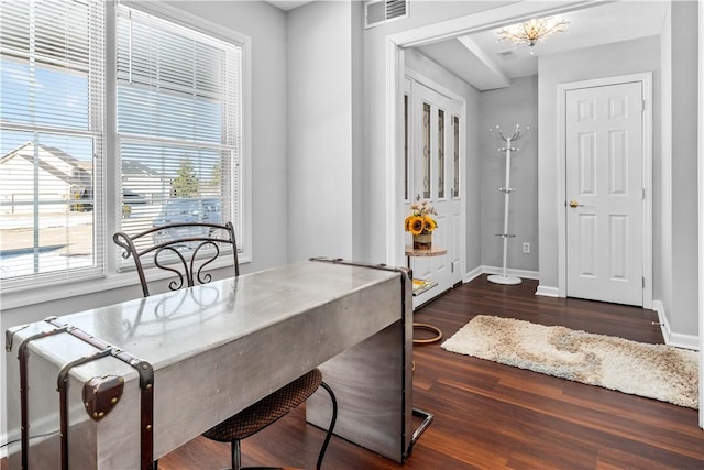 dining space with dark hardwood / wood-style floors