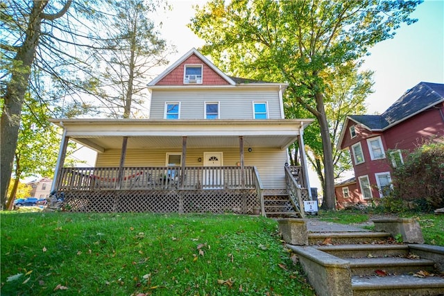 view of front of property featuring a porch and a front yard