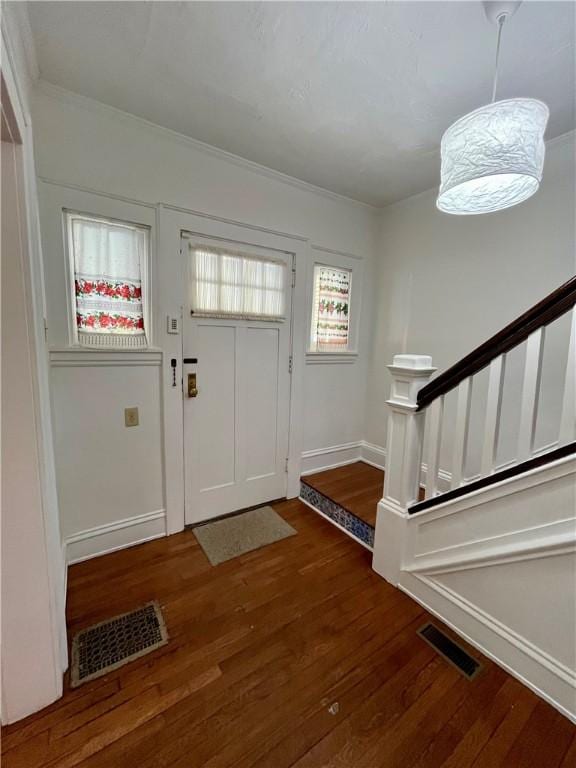 520 Berwin Ave, Brookline, PA 15226 - foyer entrance with wood finished floors, ornamental molding, and stairs