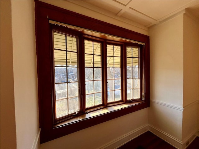 room details featuring coffered ceiling and baseboards