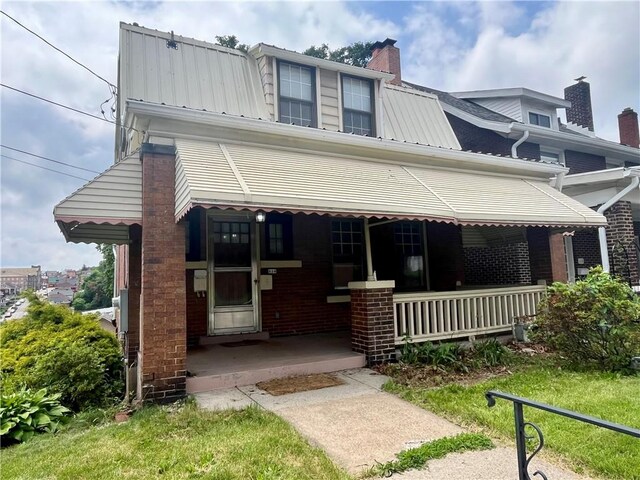 520 Berwin Ave, Brookline, PA 15226 - view of front of home with a chimney, a porch, and brick siding