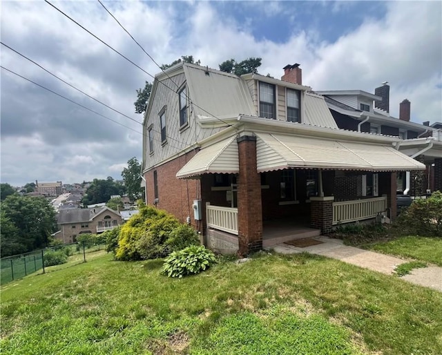 520 Berwin Ave, Brookline, PA 15226 - view of front of property featuring brick siding, covered porch, a chimney, and a gambrel roof