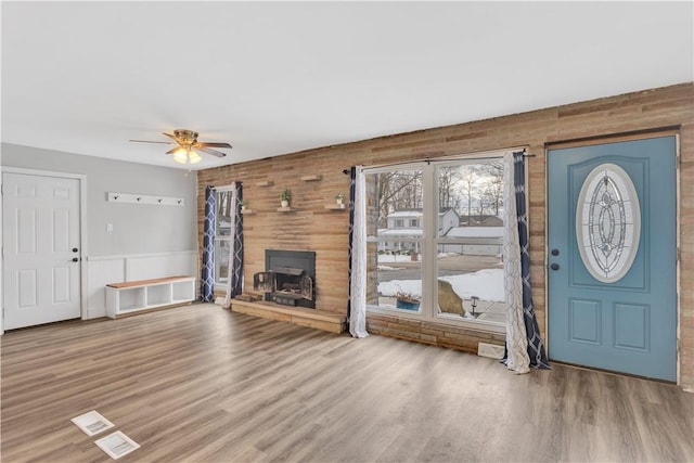 entryway with hardwood / wood-style flooring and ceiling fan