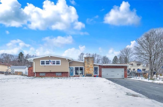 tri-level home featuring a garage