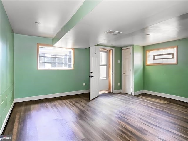 interior space with dark hardwood / wood-style flooring