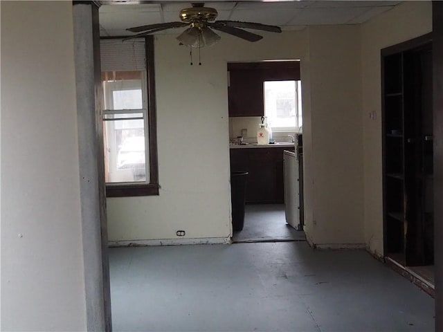 unfurnished room featuring ceiling fan