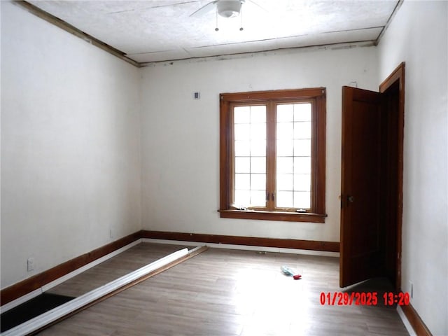 empty room featuring wood-type flooring