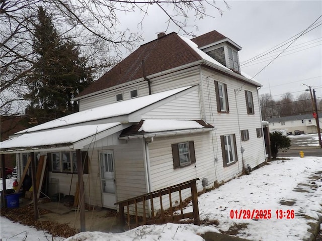 view of snowy exterior