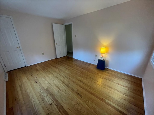 unfurnished bedroom featuring light hardwood / wood-style floors