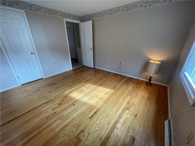 unfurnished bedroom featuring light hardwood / wood-style flooring