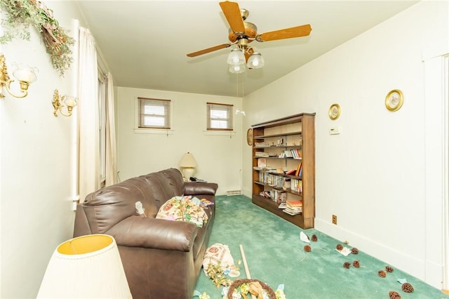 living room with carpet and ceiling fan