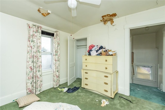 bedroom with vaulted ceiling, ceiling fan, and dark carpet