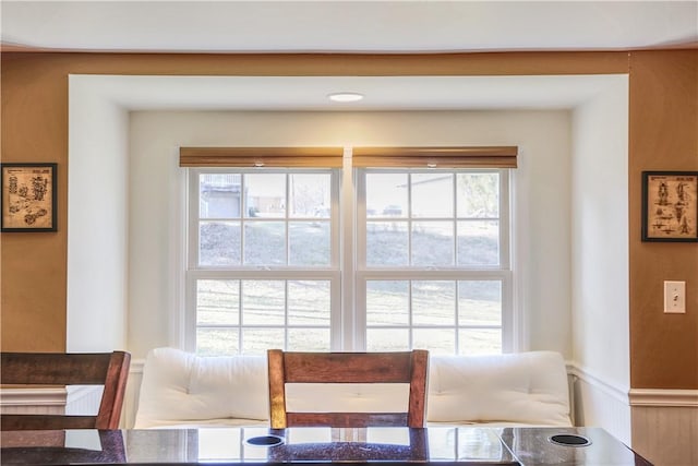 dining area with wainscoting