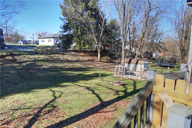 view of yard with a trampoline