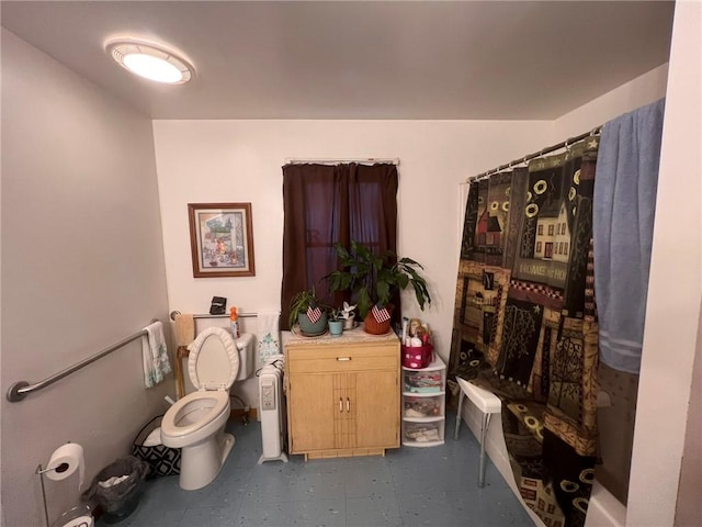 bathroom with radiator heating unit, toilet, and walk in shower