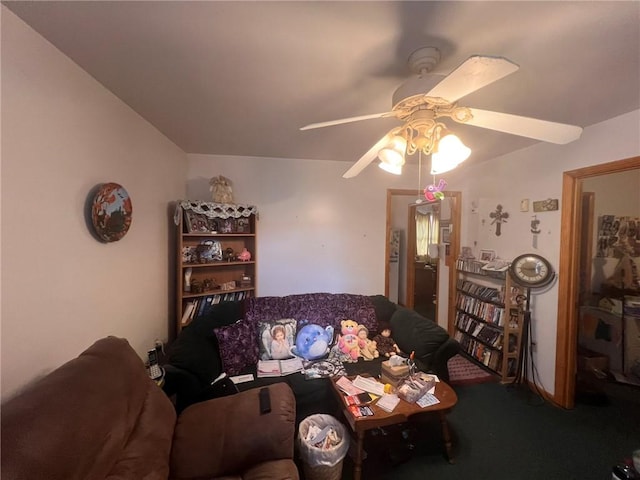 living room with ceiling fan and carpet flooring