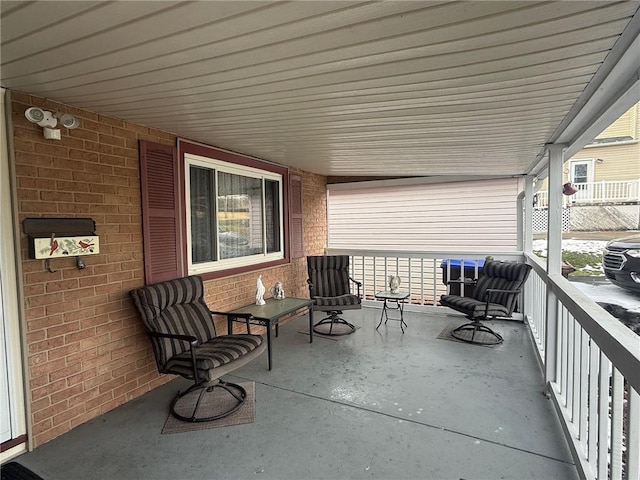 view of patio / terrace with a balcony