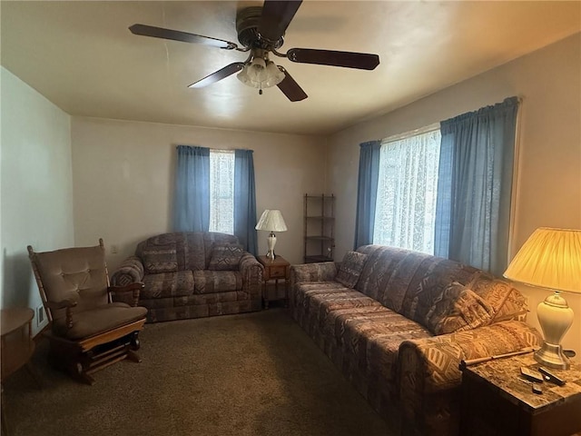 carpeted living room featuring ceiling fan