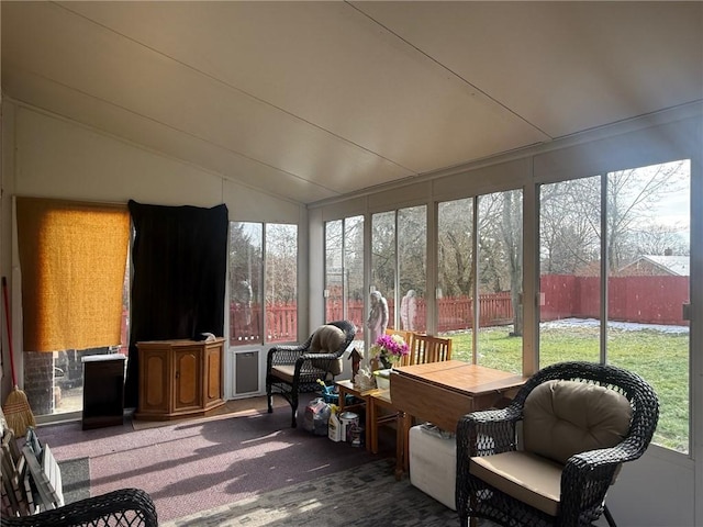 sunroom / solarium with lofted ceiling