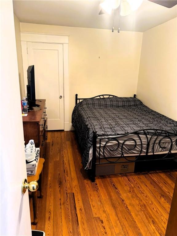 bedroom featuring dark hardwood / wood-style floors