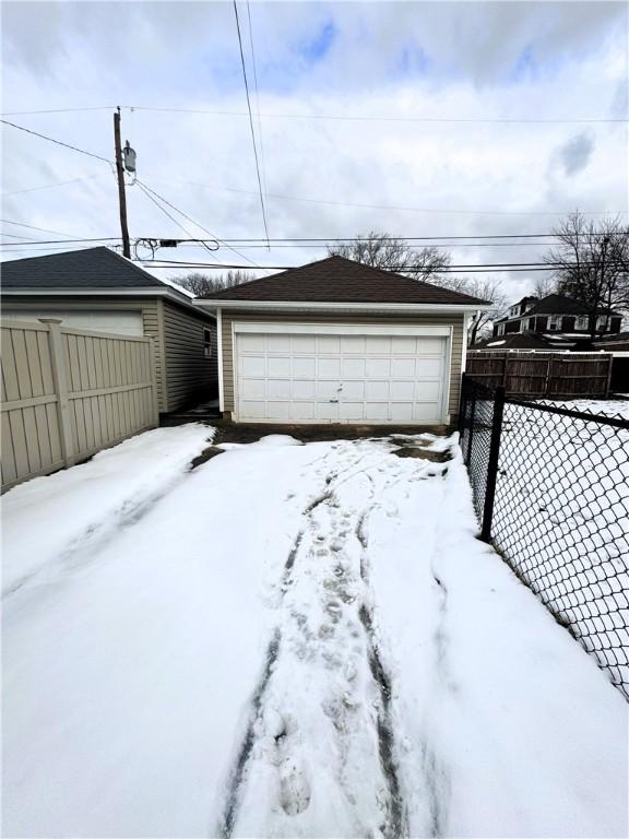 view of snow covered garage