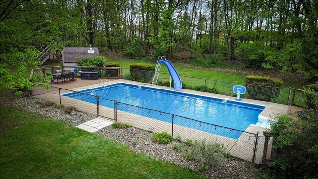 706 Clearfield Rd, Clearfield Twp, PA 16034 - view of swimming pool with a water slide and an outbuilding