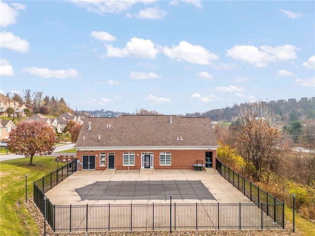 back of house with a patio area