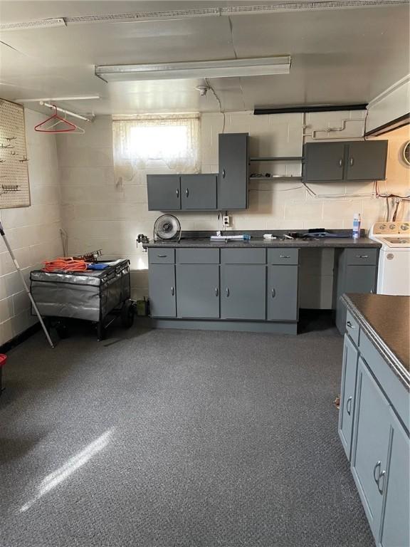 kitchen featuring washer / dryer