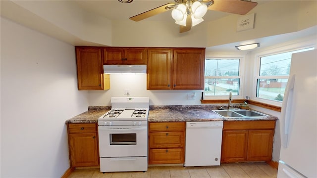 kitchen with ceiling fan, sink, light tile patterned floors, and white appliances