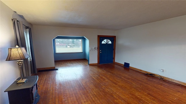 foyer featuring dark hardwood / wood-style floors