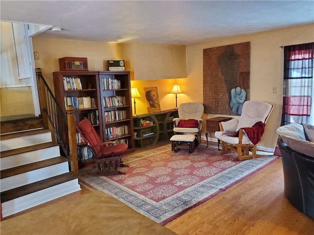 sitting room featuring hardwood / wood-style flooring