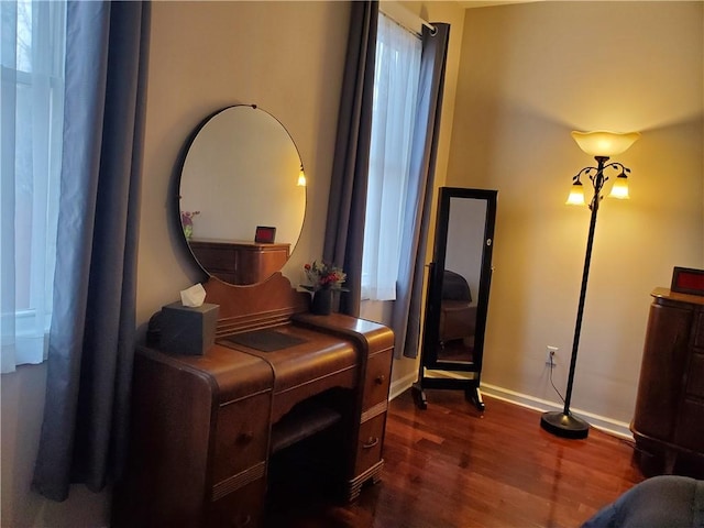 living area featuring dark wood-type flooring