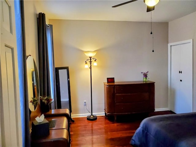 bedroom featuring hardwood / wood-style floors and ceiling fan