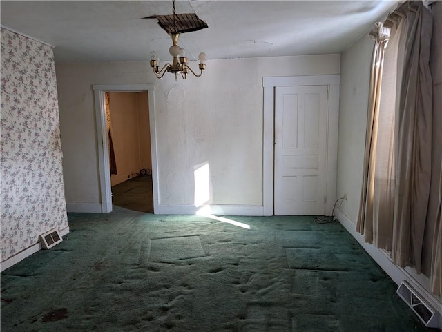 unfurnished dining area featuring a notable chandelier and carpet