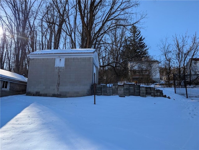 view of yard layered in snow