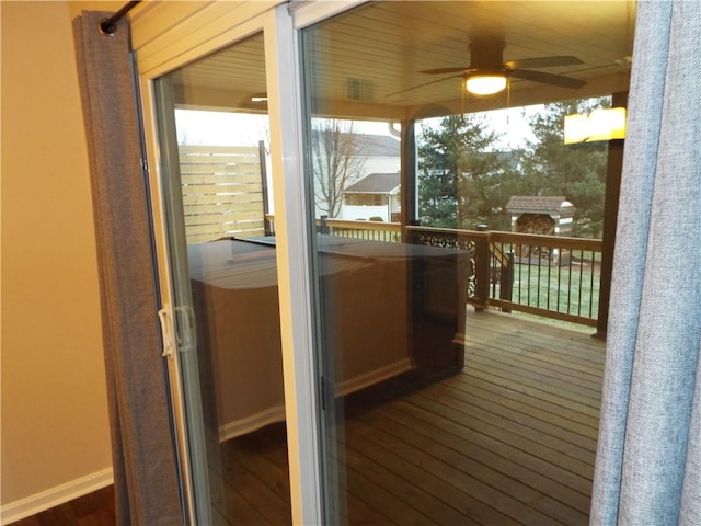 exterior space featuring ceiling fan