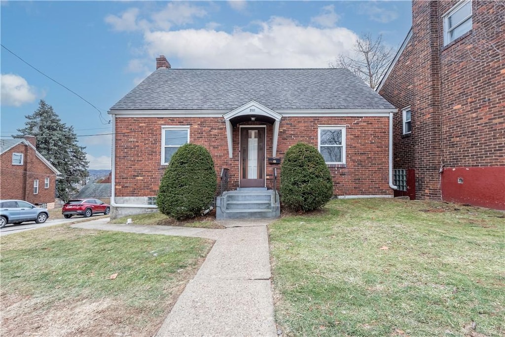 bungalow with a front lawn