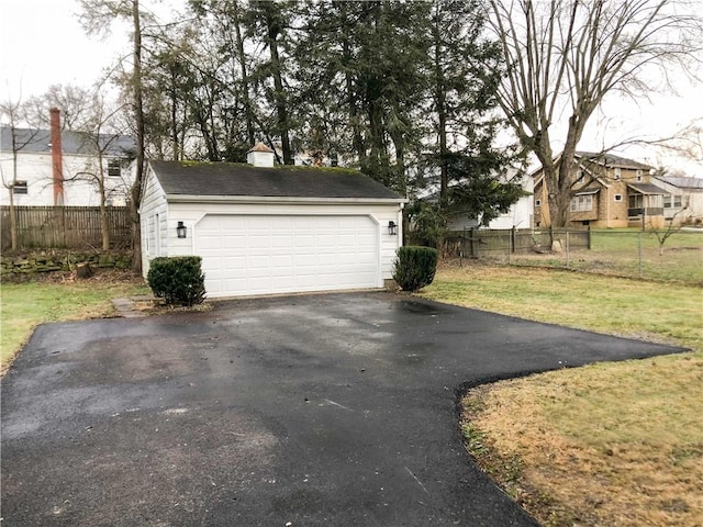 garage with a lawn