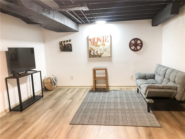 sitting room featuring hardwood / wood-style flooring