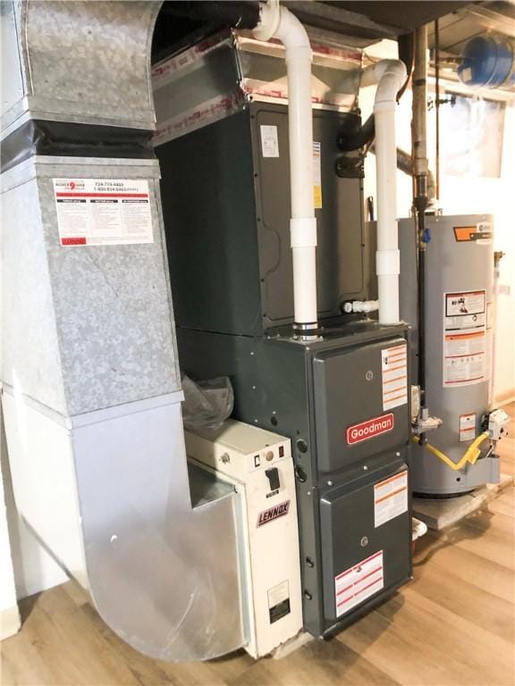 utilities with gas water heater and heating unit